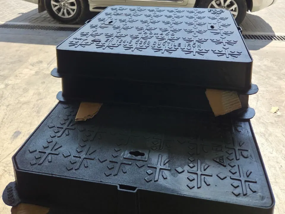 Ductile iron solid top manhole covers stacked at the FDG Export warehouse in Dubai